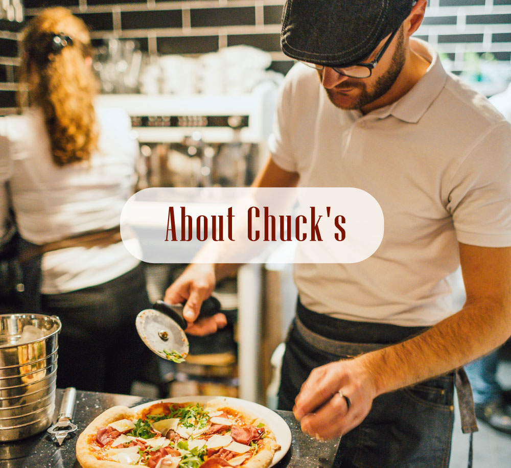 image of man making pizza