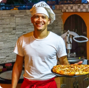 man making pizza image